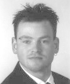 Torben_D_Passfoto_02_grau